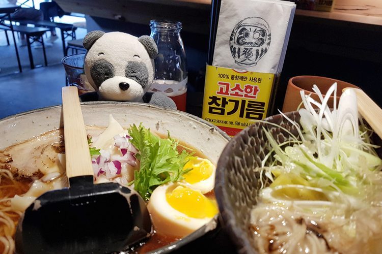 Mister Wong eating Wan Tan and Tonkotsu Ramen at Mochi Ramen Bar in Vienna's 2nd district, Austria.