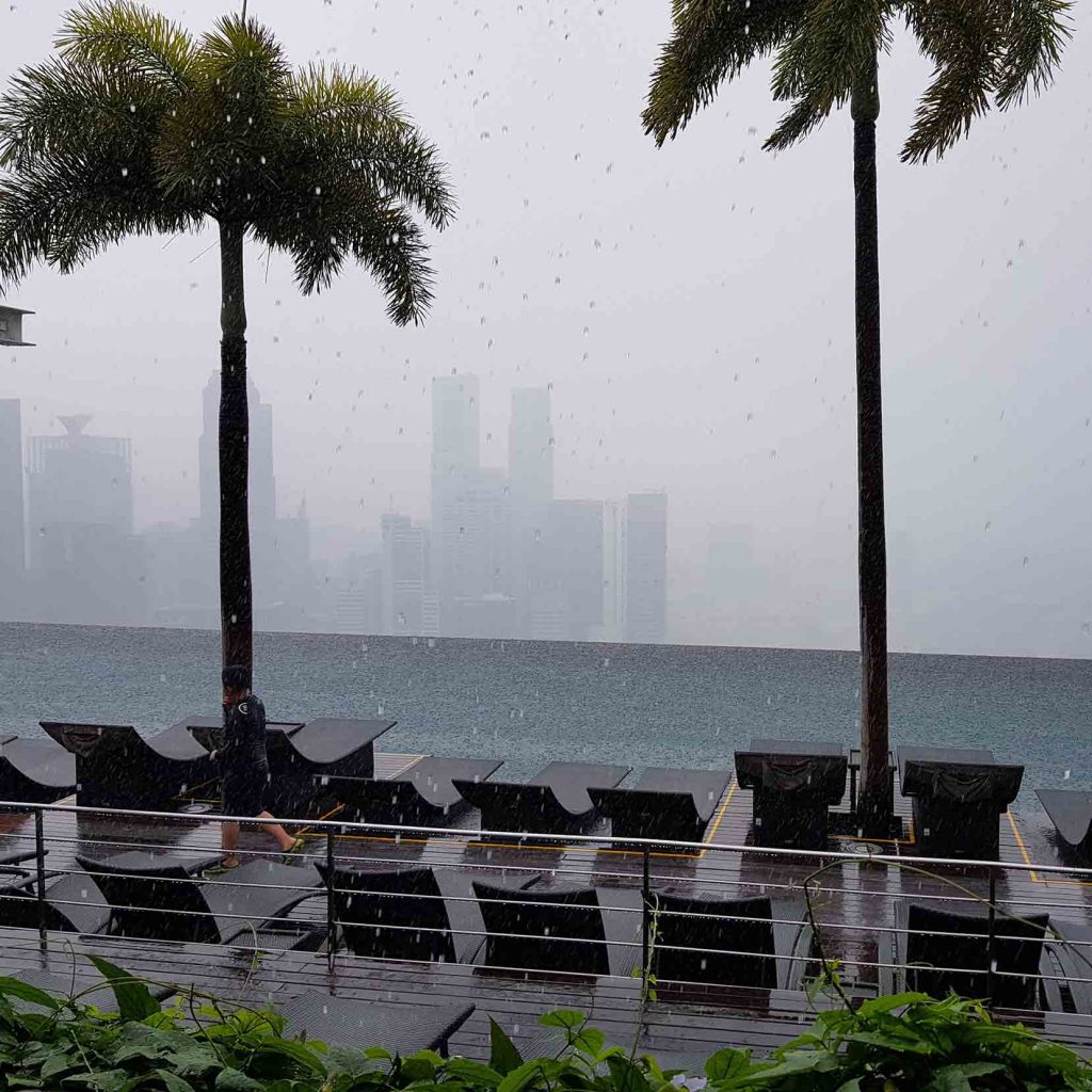 The Infinity Pool on top of Marina Bay Sands Hotel while it is raining, Singapore